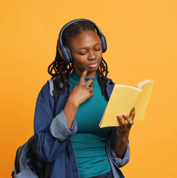 young-girl-wearing-headphones-reading-interesting-2026-03-19-02-06-29-utc(1)